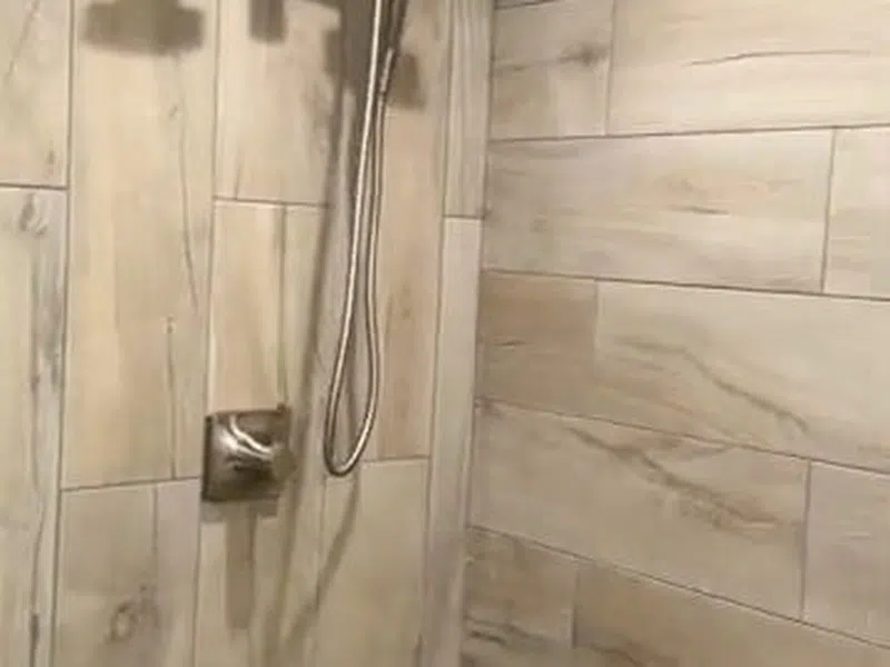 Bathroom shower or bathtub fixture area during installation or remodel work for Walk-In Shower Conversion in a PebbleCreek Active Adult Home: Process, Cost, and What to showing bathroom shower bathtub fixture area installation remodel work walk conversion pebblecreek closeup