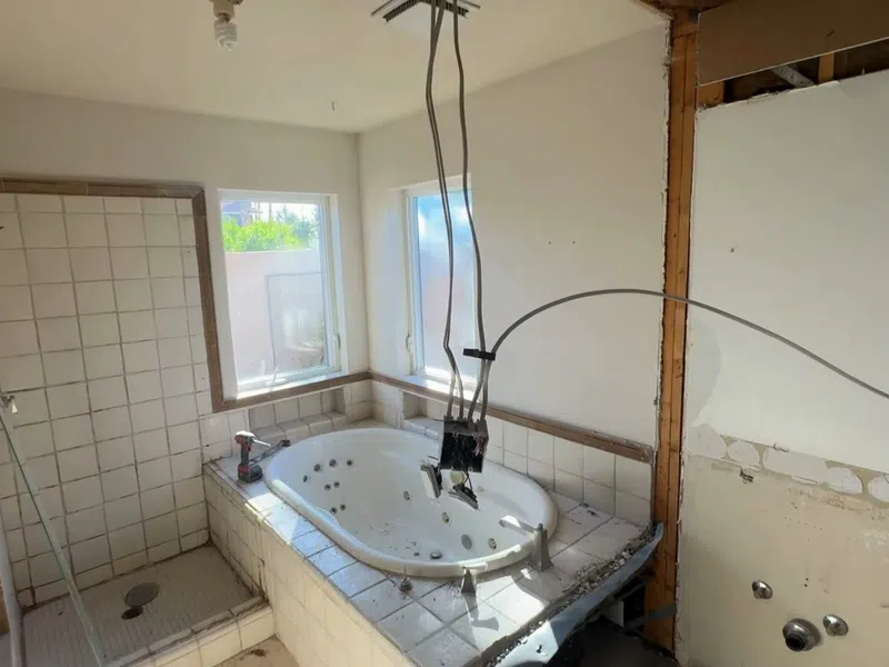 Bathroom shower or bathtub fixture area during installation or remodel work for Walk-In Shower Conversion in a PebbleCreek Active Adult Home: Process, Cost, and What to showing bathroom shower bathtub fixture area installation remodel work walk conversion pebblecreek detail