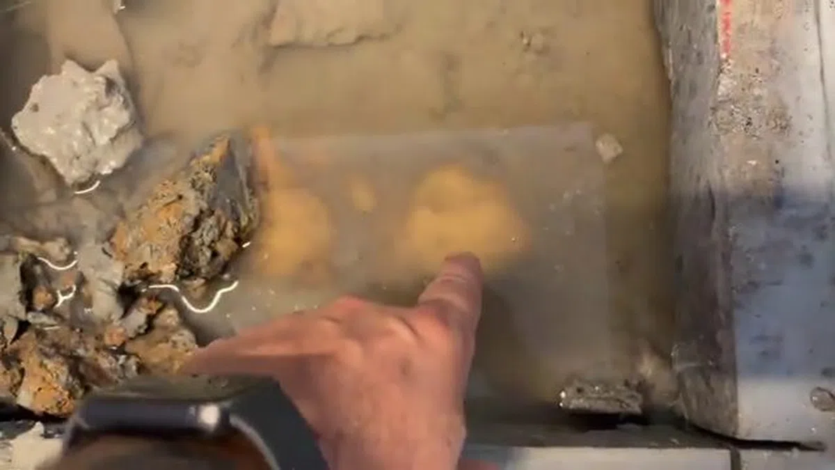 Opened slab area and leak detection equipment used to locate a hidden pipe leak for Pool Evaporation or Pool Leak? How to Tell the Difference in a Goodyear Summer