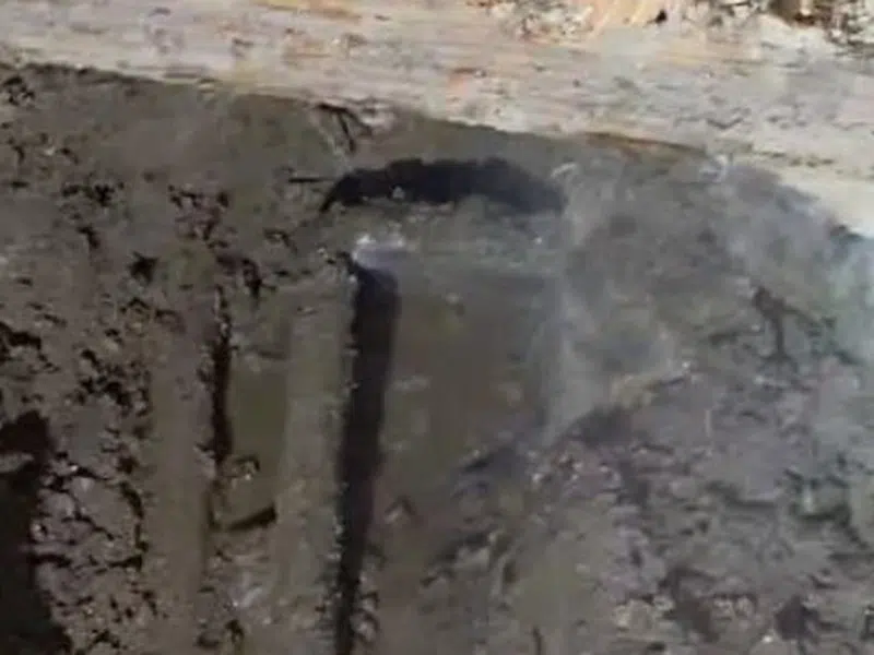 Opened slab area and leak detection equipment used to locate a hidden pipe leak for Should You Repipe Your Goodyear Home Before Selling? The Buyer Inspection Reality