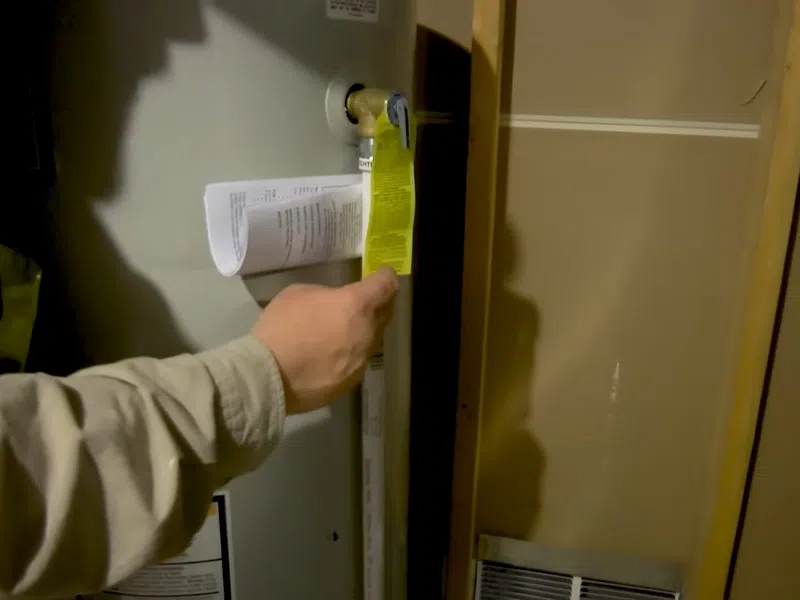 Tank water heater connections, valve fittings, and service components for Choosing a Water Softener for a Goodyear Home: Sizing, Salt Types, and Utility Differences showing tank water heater connections valve fittings components choosing softener body detail
