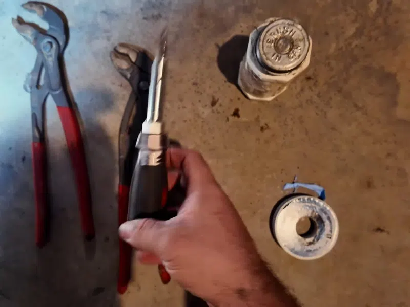 Tank water heater connections, valve fittings, and service components for Outdoor Kitchen Gas Lines in Palm Valley: What the Permit Process Actually Looks Like showing tank water heater connections valve fittings components outdoor kitchen gas line closeup