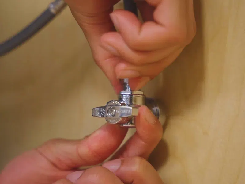Under-sink reverse osmosis filter system connected below a kitchen sink for Why Goodyear Water Is So Hard — and What It’s Doing to Your Plumbing