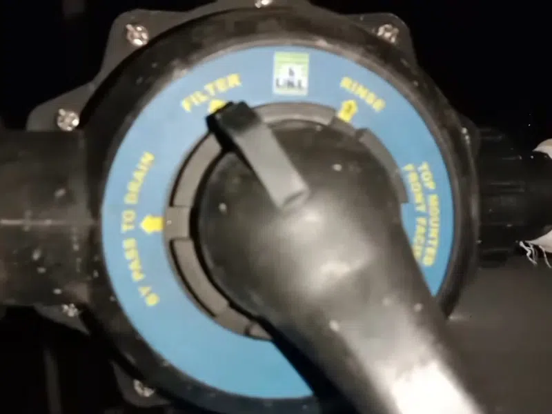 Whole-home water softener with control valve, brine tank, and plumbing connections for The Caliche Problem: Why West Valley Sewer Work Costs More — and When Trenchless showing whole water softener control valve brine tank connections caliche sewer excavation detail